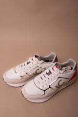 Deportiva con plataforma tricolor en tejidos combinados y detalles en piel