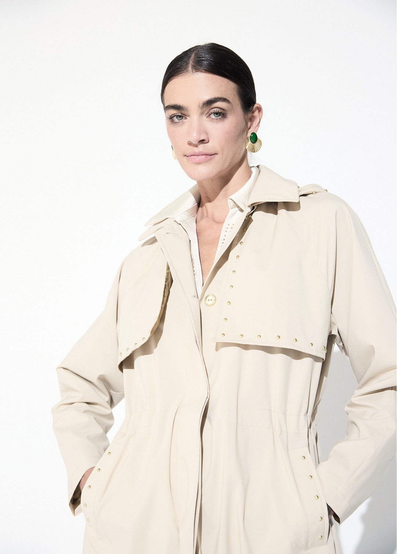 Trench coat with studded detail