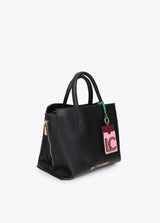 Leather-effect shopper with contrasting pendant