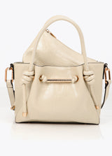 Crossbody bag with metal tube detail with die-cut logo