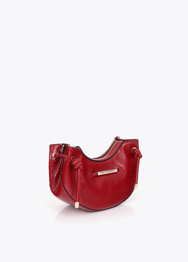 Half-moon shoulder bag with metallic tube detail with die-cut logo