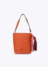 Faux leather shoulder bag with pompoms
