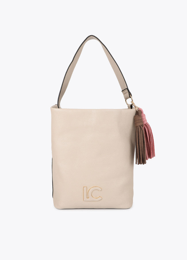 Leather-effect shopper with logo detail on the handle and pompoms