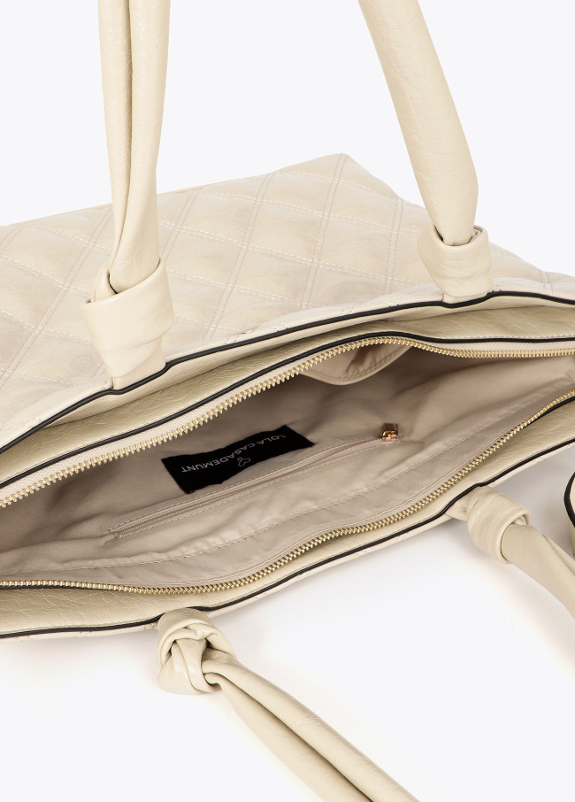 Padded shopper with double stitching and tubular puller