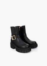 Flat ankle boot with strap detail and leopard buckle