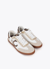Sneaker with logo stud detail