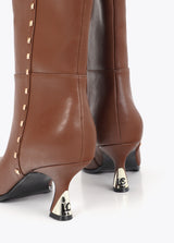 High boot with personalized heel and stud strip detail