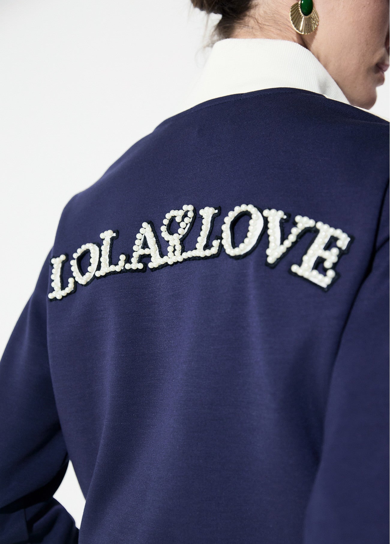 Sweatshirt with two-tone side stripe detail and rhinestones, front and back patch