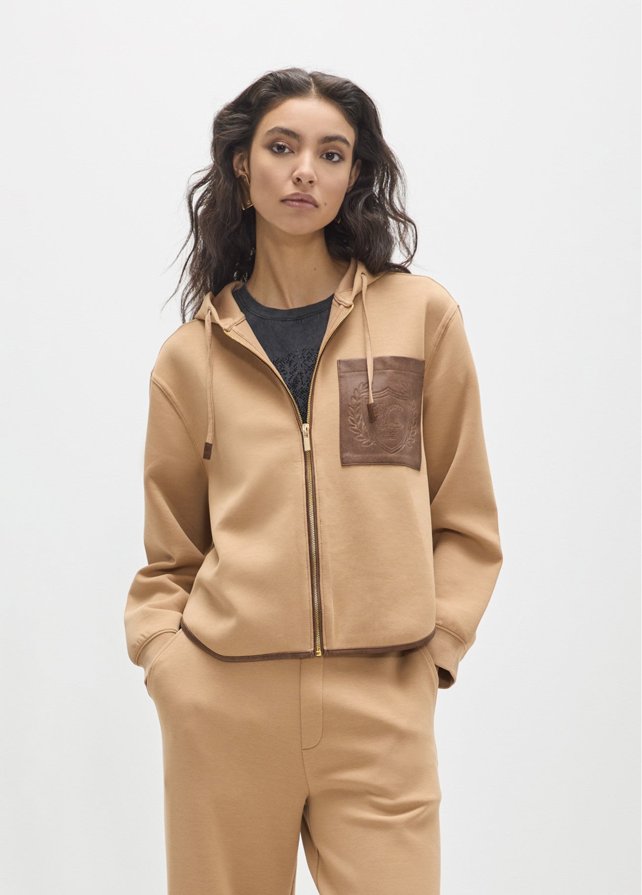 Open sweatshirt with faux leather pocket on the front and maxi patch on the back