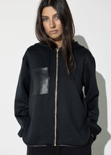 Open sweatshirt with faux leather pocket on the front and maxi patch on the back