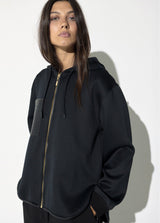 Open sweatshirt with faux leather pocket on the front and maxi patch on the back