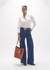 Long straight denim with two-tone side piece and studs on the sides