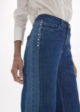 Long straight denim with two-tone side piece and studs on the sides