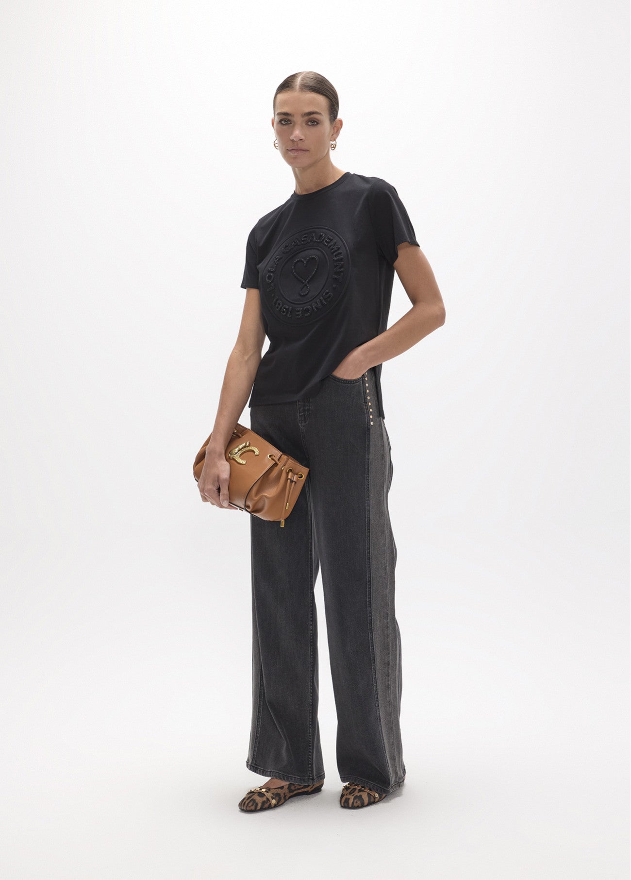 Long straight denim with two-tone side piece and studs on the sides