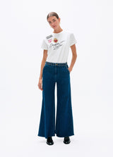 Flared denim with studs on waistband and front pockets
