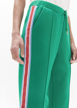 Jogger pants with three-color side band, drawstring adjustment and metallic details
