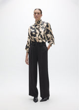 Long palazzo trousers with flower detail at the waist