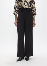 Long palazzo trousers with flower detail at the waist