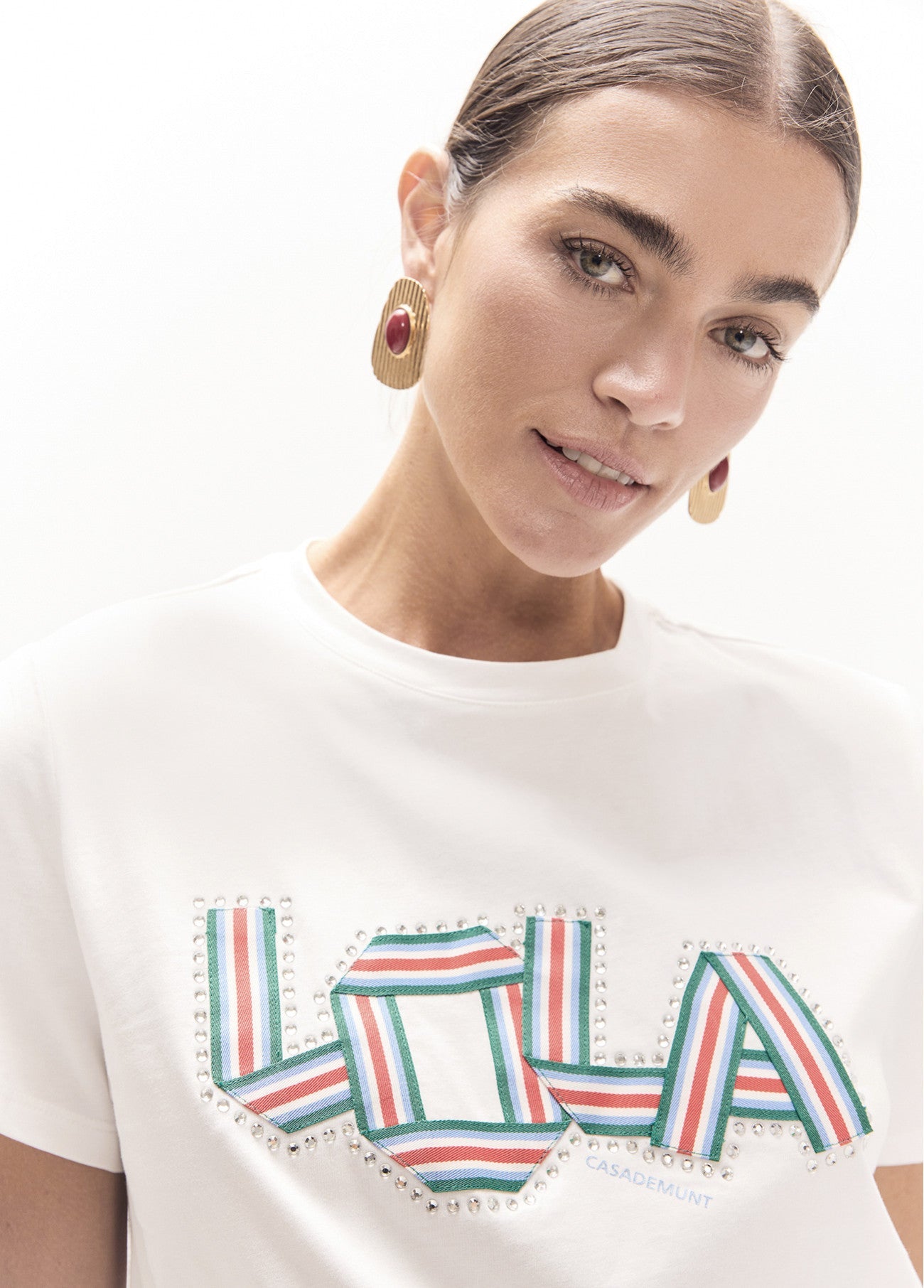 Round neck t-shirt with side slits detail bands fabric with crystals