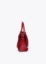 Crossbody bag with metal tube detail with die-cut logo