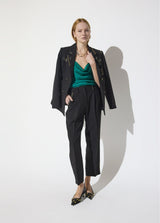 Ankle-length trousers with studded detail on pocket and " see you "