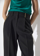 Ankle-length trousers with studded detail on pocket and " see you "