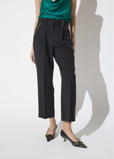 Ankle-length trousers with studded detail on pocket and " see you "